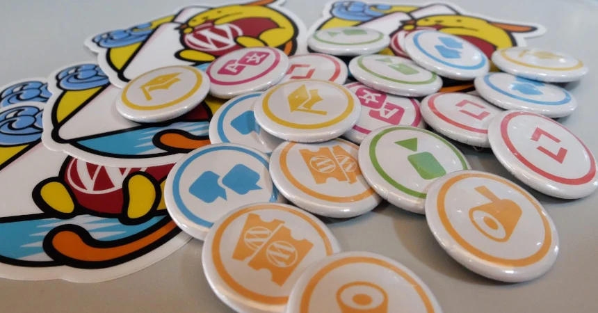 WordPress.org contributor pins on a table